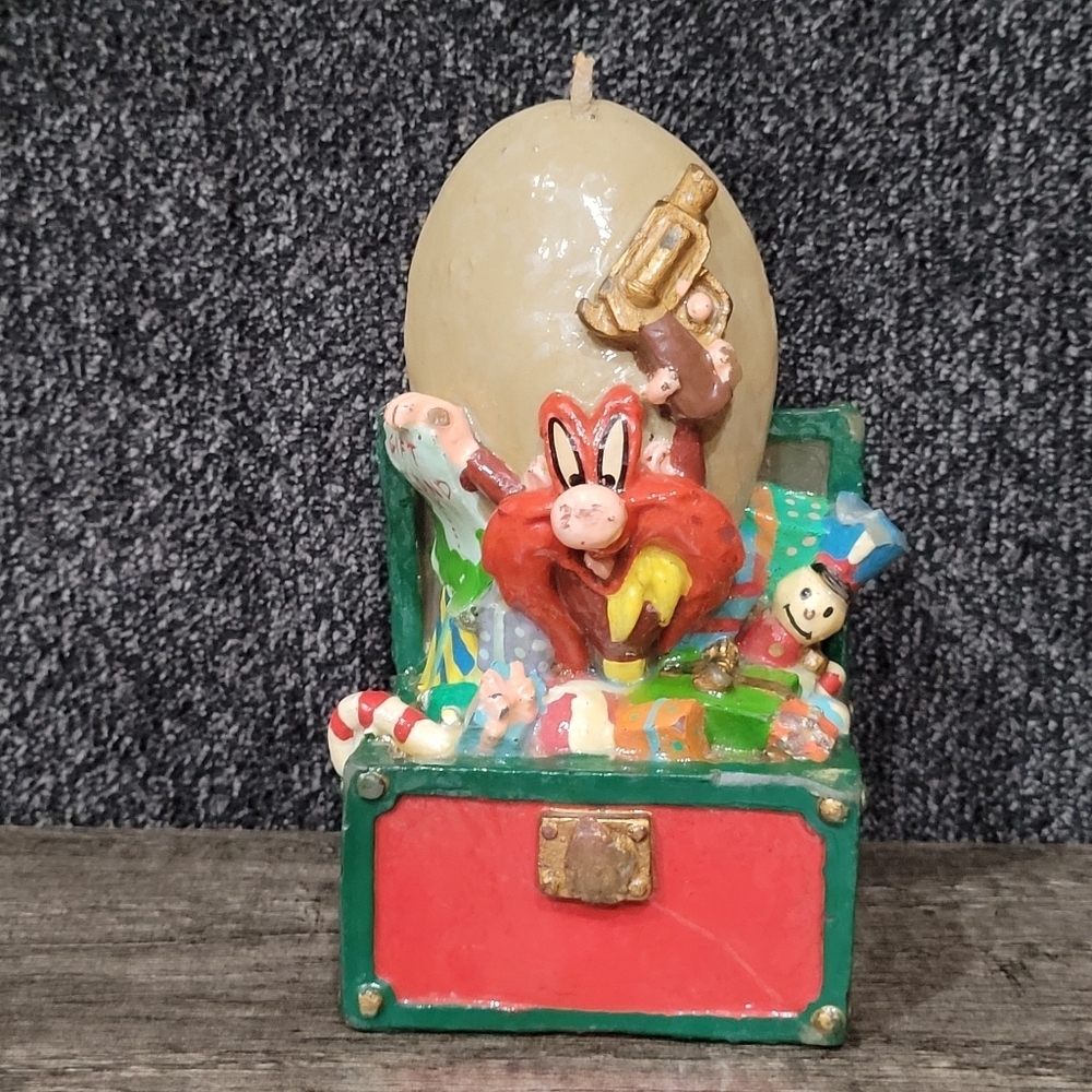 Yosemite Sam figural candle. Sitting in Toy box